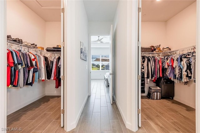 spacious closet with ceiling fan