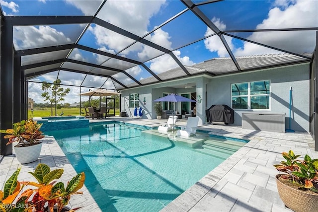 view of pool with a lanai, a patio area, a ceiling fan, and area for grilling