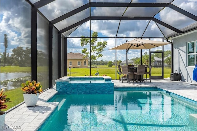 view of swimming pool featuring glass enclosure, an in ground hot tub, a water view, a patio, and a lawn