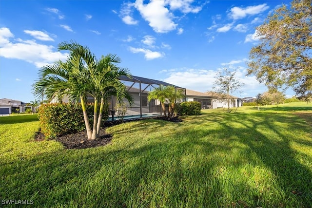 view of yard featuring a lanai