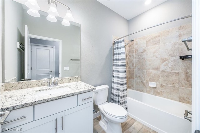 full bathroom featuring vanity, shower / bath combination with curtain, wood-type flooring, and toilet