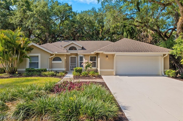 ranch-style home with a garage