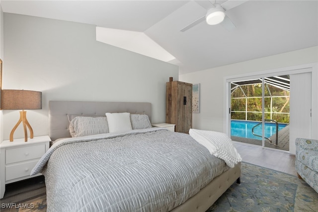 bedroom featuring vaulted ceiling, access to exterior, dark hardwood / wood-style floors, and ceiling fan