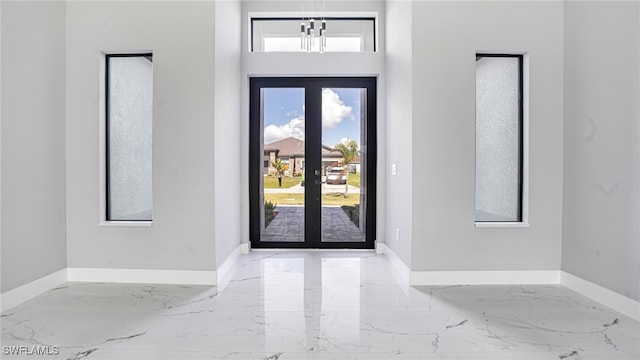 entryway featuring french doors