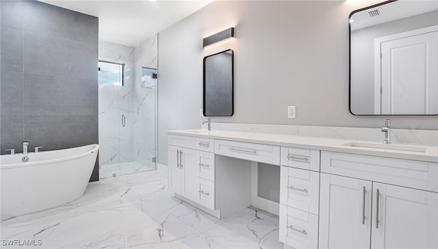 bathroom with vanity and separate shower and tub