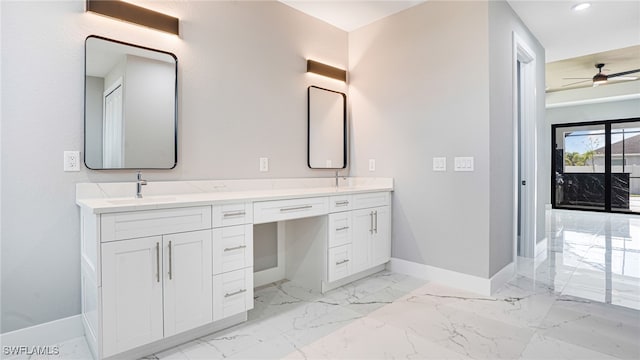 bathroom featuring ceiling fan and vanity