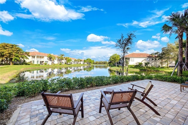 view of patio / terrace featuring a water view