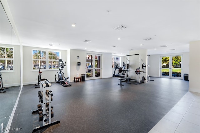 exercise room with french doors and a wealth of natural light