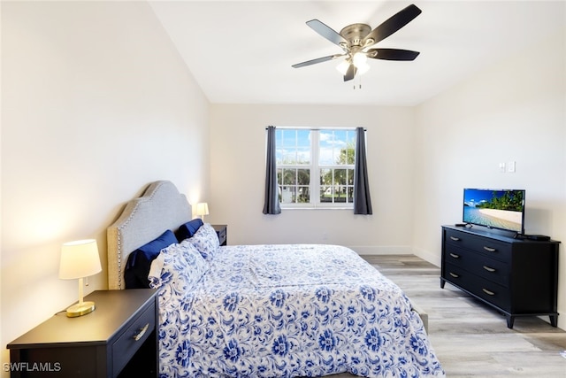 bedroom featuring ceiling fan and light wood-type flooring