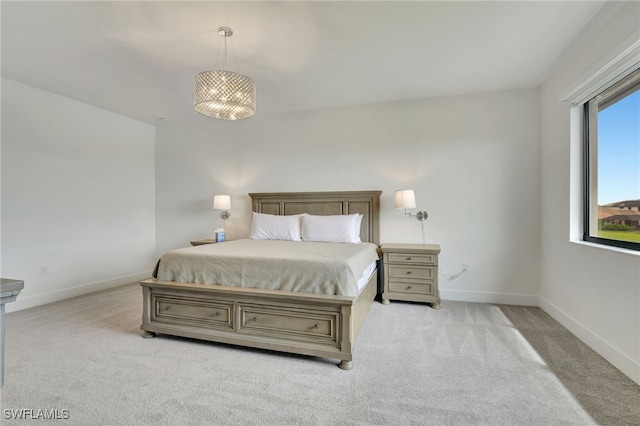 bedroom with light colored carpet