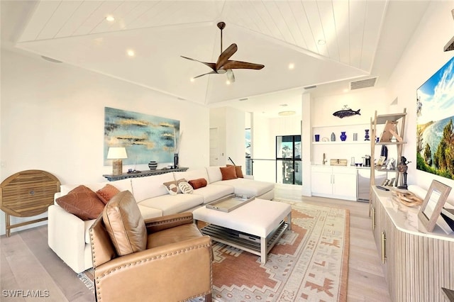 living room featuring lofted ceiling, light hardwood / wood-style flooring, wooden ceiling, and ceiling fan