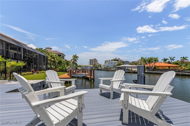 dock area featuring a water view and a lanai