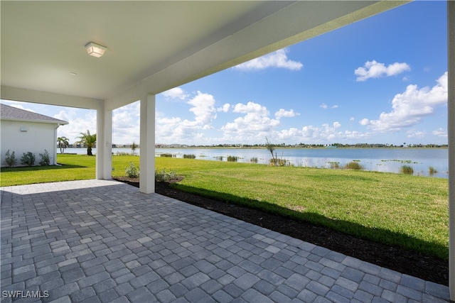 view of patio / terrace with a water view