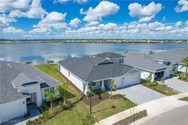 bird's eye view with a water view