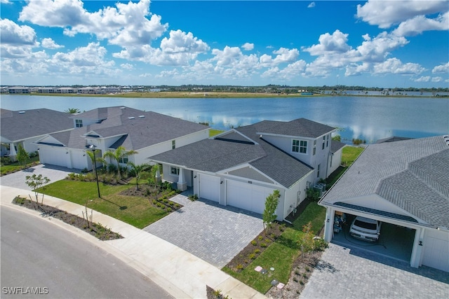 drone / aerial view featuring a water view