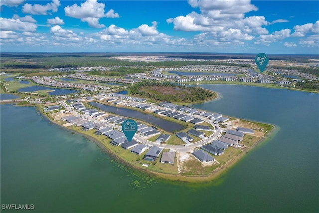 bird's eye view with a water view