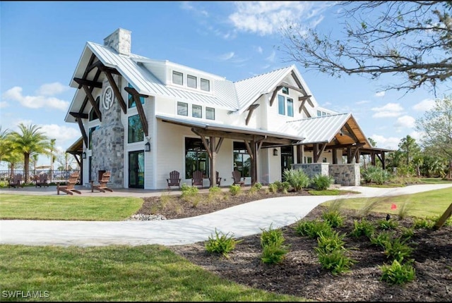 view of front of home with a front lawn