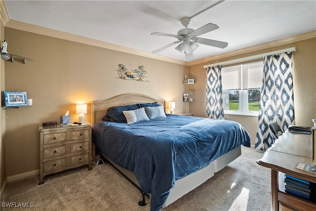 carpeted bedroom with crown molding, a textured ceiling, and ceiling fan