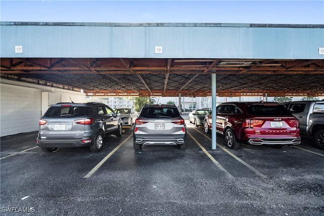 view of parking with a carport