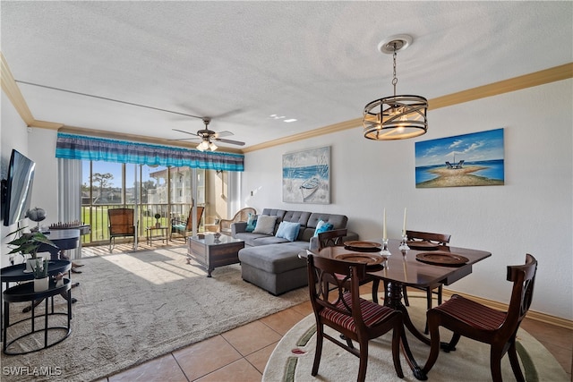 living room with ornamental molding, light tile patterned flooring, and a textured ceiling