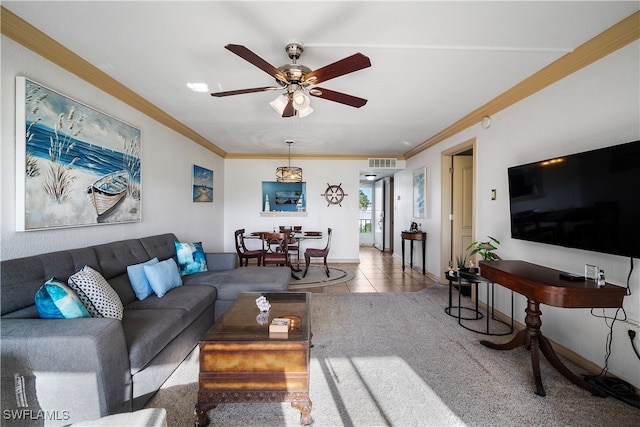 tiled living room with crown molding and ceiling fan