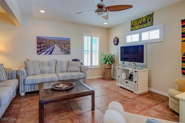 living room featuring tile patterned floors and ceiling fan