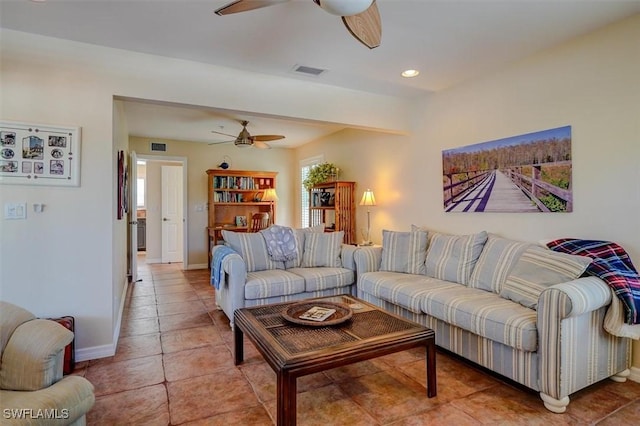 living room with tile patterned floors and ceiling fan