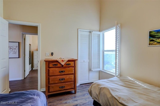 bedroom featuring dark hardwood / wood-style floors