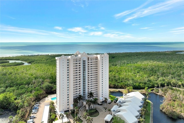 birds eye view of property featuring a water view