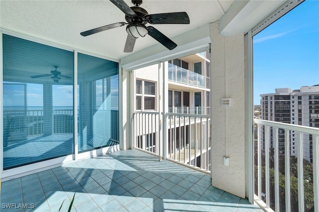 balcony featuring ceiling fan