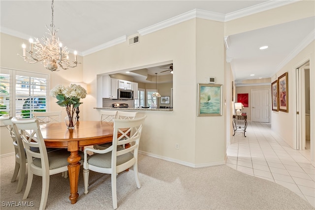 dining space featuring light carpet, ceiling fan with notable chandelier, and ornamental molding