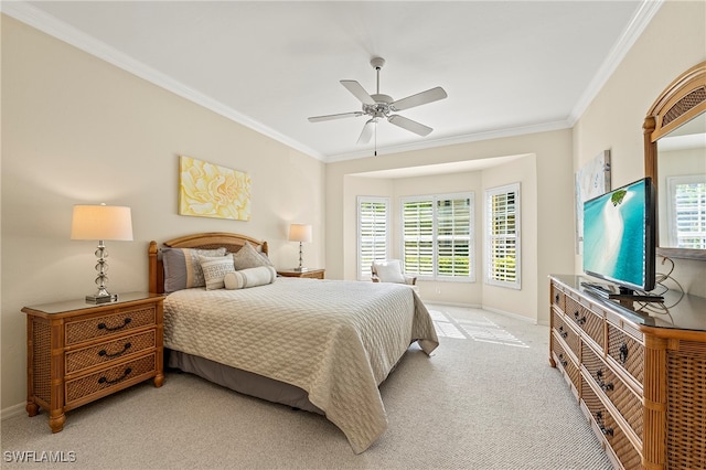 carpeted bedroom featuring ceiling fan, crown molding, and multiple windows