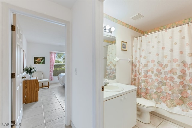 bathroom with tile patterned flooring, vanity, toilet, and a shower with shower curtain