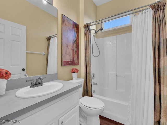 full bathroom with shower / tub combo with curtain, vanity, toilet, and wood-type flooring