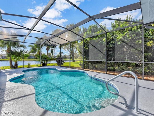 view of swimming pool featuring a lanai, a water view, and a patio area