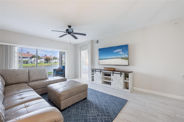 living room with ceiling fan