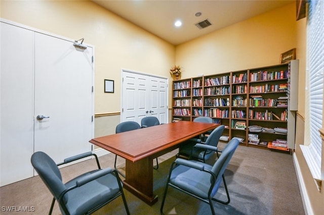 office area with high vaulted ceiling, carpet, and a wealth of natural light