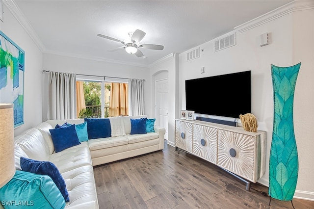 living room with hardwood / wood-style floors, crown molding, and ceiling fan