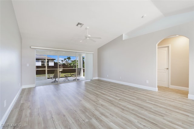 unfurnished living room featuring lofted ceiling, ceiling fan, and light wood-type flooring