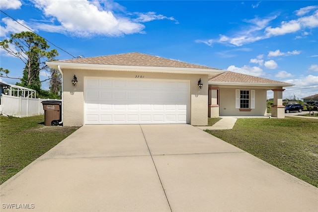 ranch-style house with a front yard, a garage, and covered porch