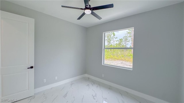 unfurnished room with ceiling fan