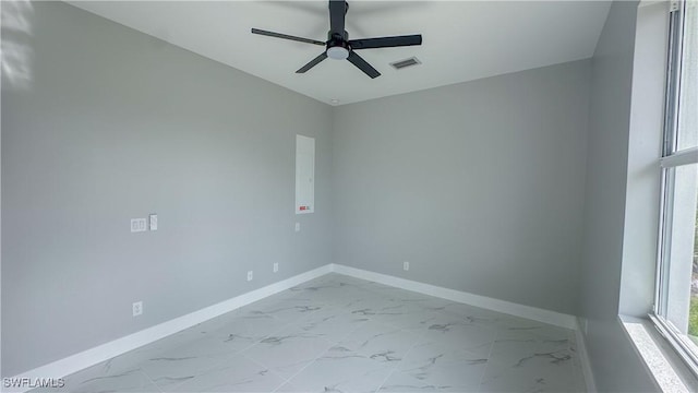 empty room featuring ceiling fan