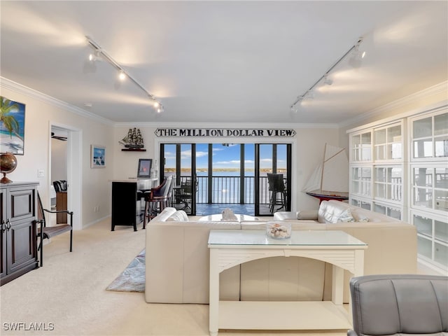 1925 Clifford St Unit 1202, Fort Myers, FL 33901 - carpeted living room featuring rail lighting, crown molding, a water view, an office area, and baseboards