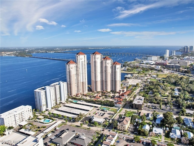 birds eye view of property with a water view