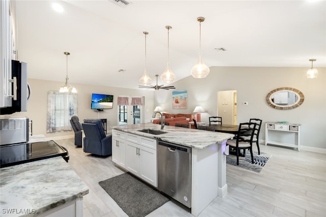 kitchen featuring dishwasher, white cabinets, hanging light fixtures, sink, and a kitchen island with sink