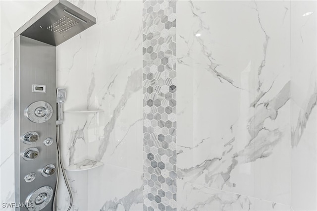 details featuring tiled shower