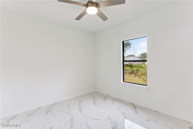 unfurnished room with ceiling fan