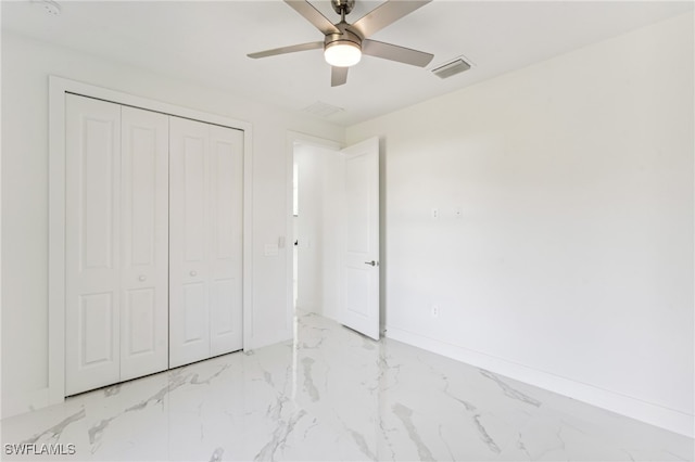 bedroom featuring a closet and ceiling fan