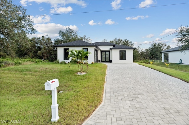 view of front of home with a front yard