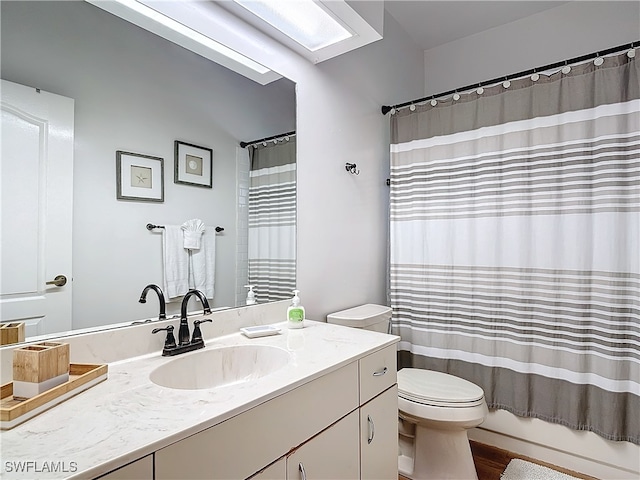 full bathroom with vanity, shower / bath combo with shower curtain, toilet, and wood-type flooring